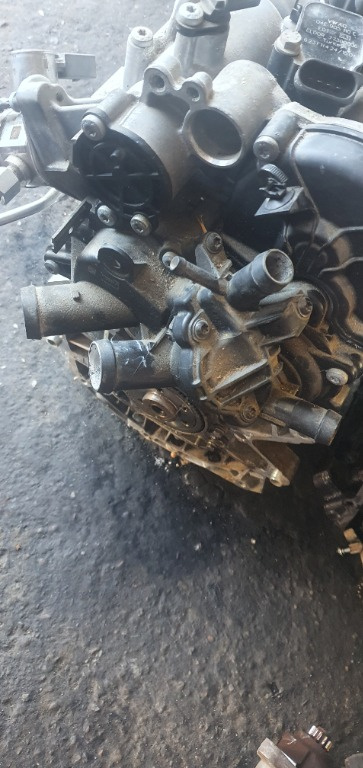 04E121042M Pompa apa cu corp termostat Audi Q3 1.4 TSI