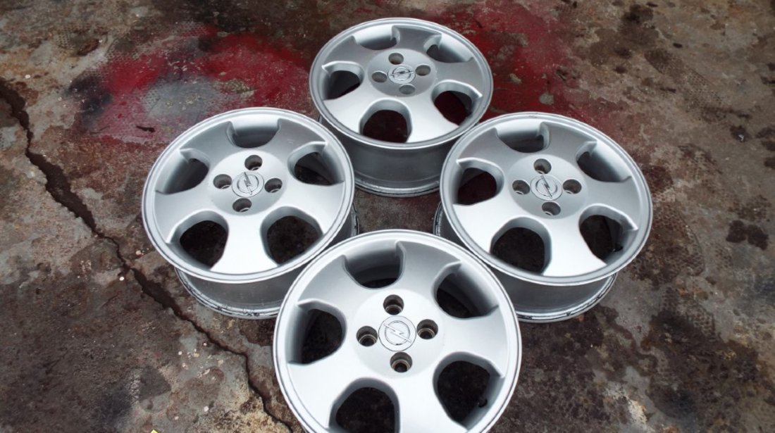 4 jante originale opel pe 15 dis 4x100 astra,corsa.D,meriva,vectra,etc pret 810 ron toate4