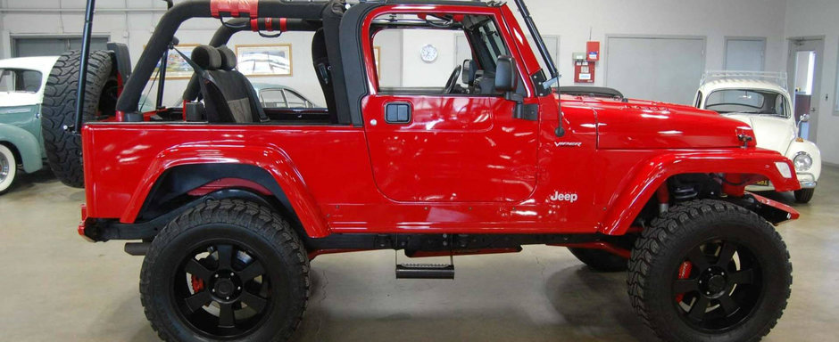 Ai zice ca-i un Wrangler obisnuit. Asta pana ridici capota si vezi ce ascunde acolo Ai zice ca-i un Wrangler obisnuit. Asta pana ridici capota si vezi ce ascunde acolo