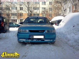 am un opel vectra 1 8i din 1994 si as vrea  sa il fac putin mai tuning ceva idei sau poze ??