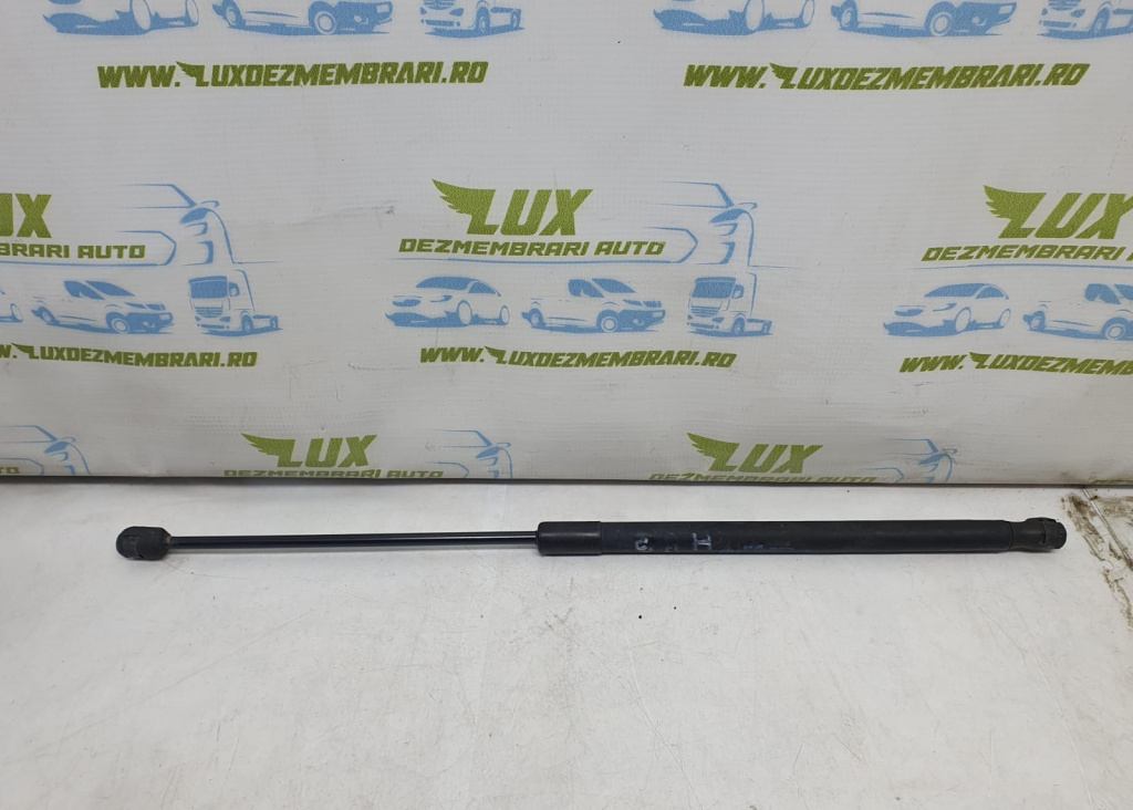 Amortizor capota 24465295 Opel Astra H [2004 - 2007]