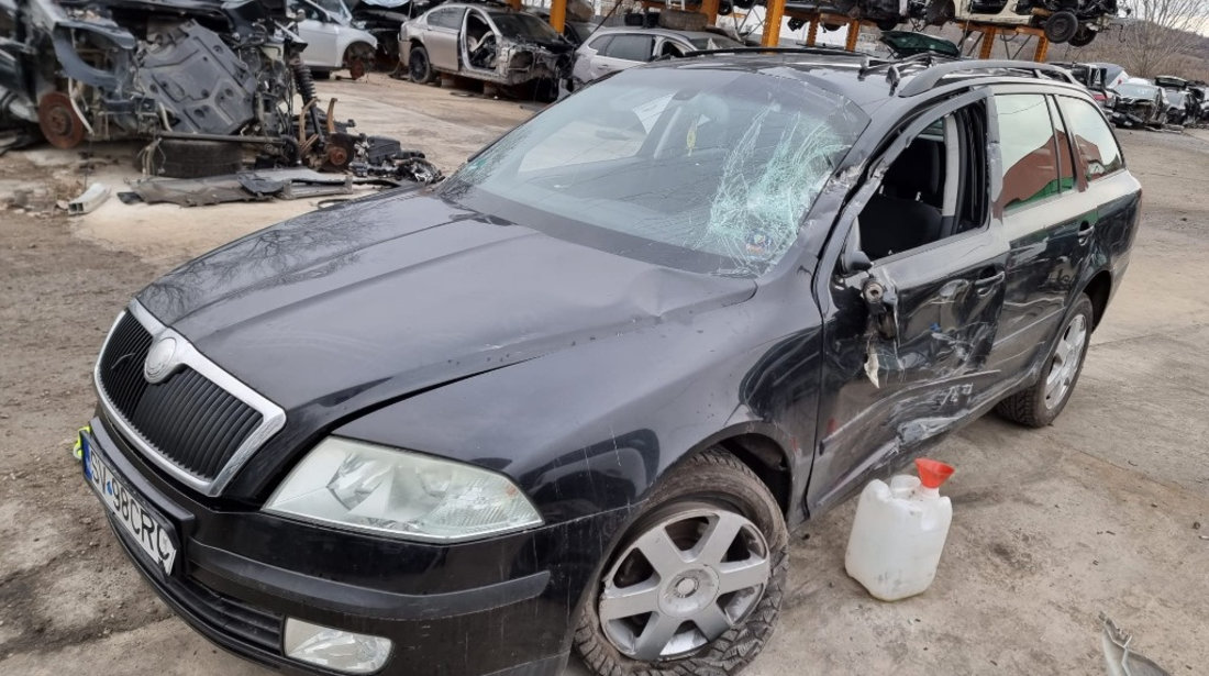 Amortizor capota Skoda Octavia 2 2005 combi/break 1.6 benzina