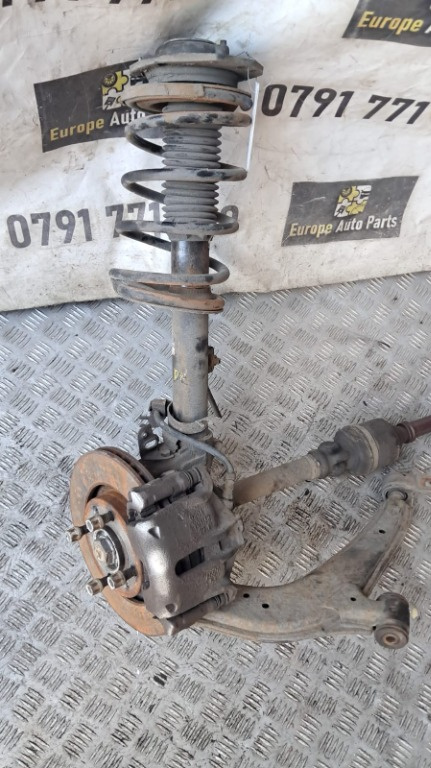 Amortizor cu arc dreapta fata Peugeot Partner 2.0 HDI cod motor RHY , transimie manuala an 2004