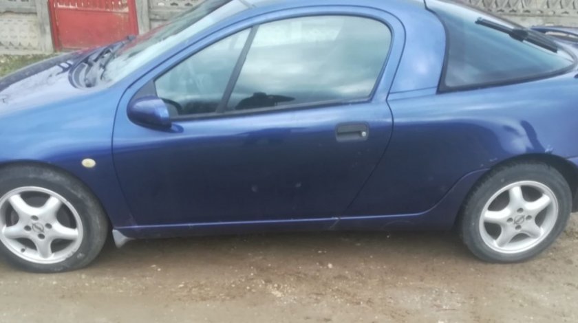 AMORTIZOR CU ARC SI FLANSA DREAPTA FATA OPEL TIGRA FAB. 1994 – 2000 ⭐⭐⭐⭐⭐