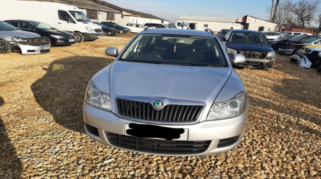 Amortizor fata stanga Pret ansamblu complet: Arc, Telescop si Flansa. Skoda Octavia 2 [facelift] [2008 - 2013] Combi wagon 5-usi 1.6 TDI MT (105 hp)