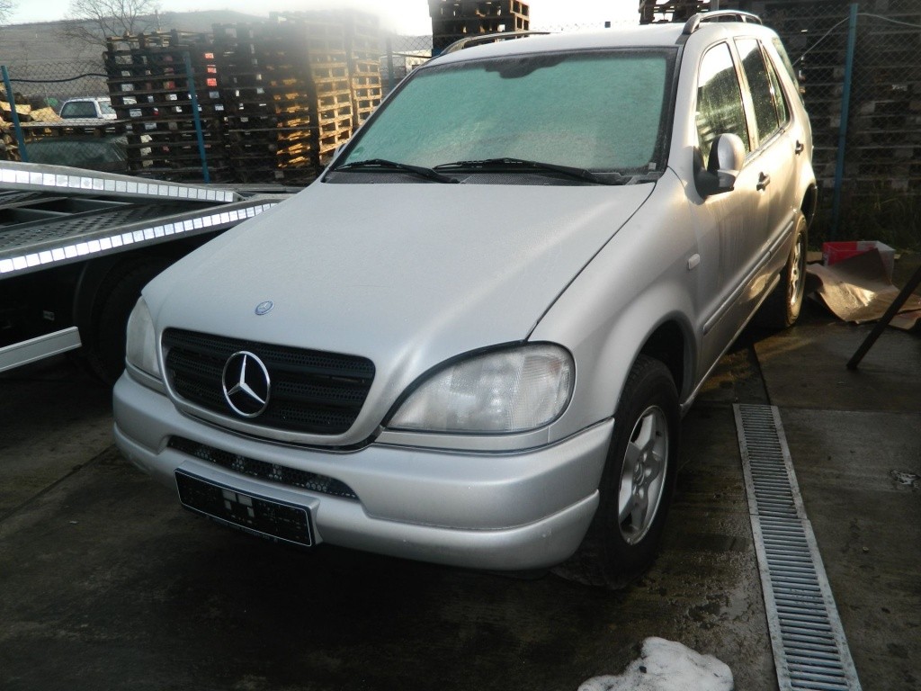 Arcuri stanga - dreapta Mercedes ML model 1999