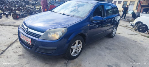 Aripa fara stanga Opel ASTRA H 1.4 benzina 66KW / 90 CP cod motor Z14XEP ,transmisie manula 5+1 cod ...