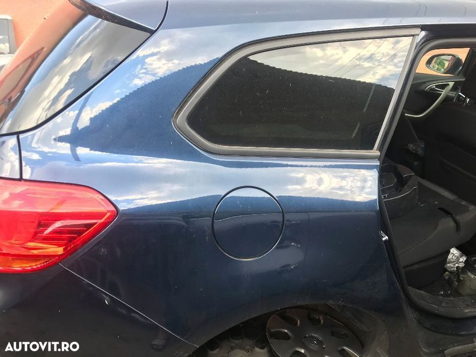 Aripa stanga / dreapta spate Opel Astra J combi ,an2010-2016.