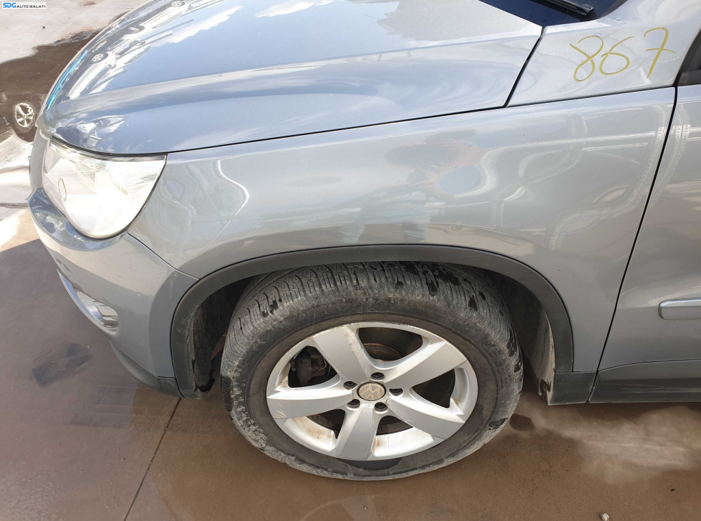 Aripa Stanga Fata Fara Bandou cu Imperfectiuni Volkswagen Tiguan NFL Non Facelift 2007 - 2011 Culoare LR7N [K6164]