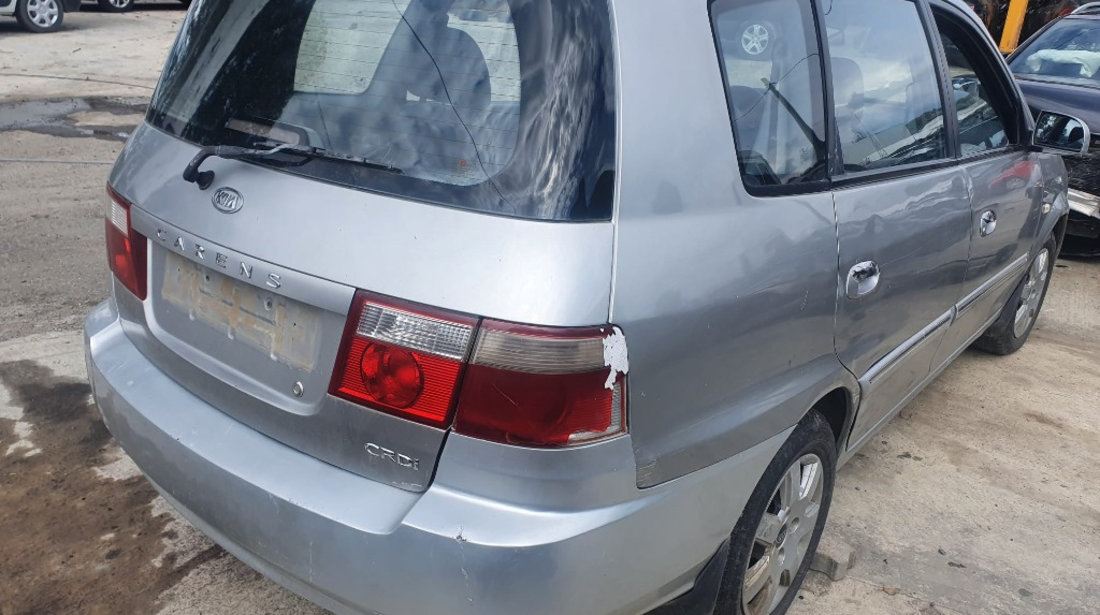 Aripa stanga fata Kia Carens 2004 break 2.0 crdi