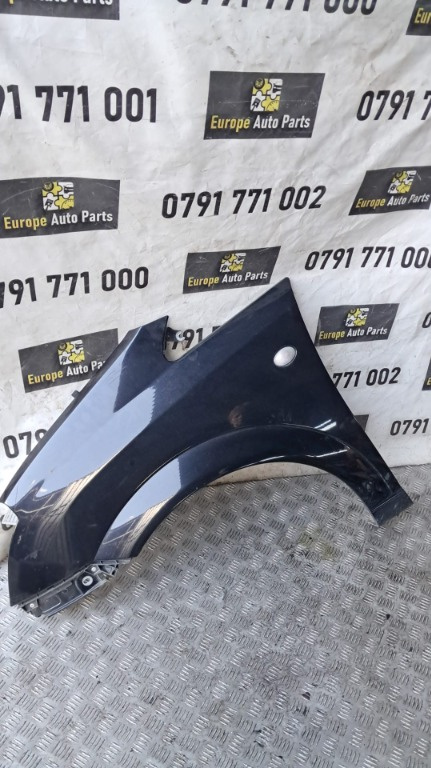 Aripa stanga fata neagra Opel Meriva an 2007 cod culoare Z20R