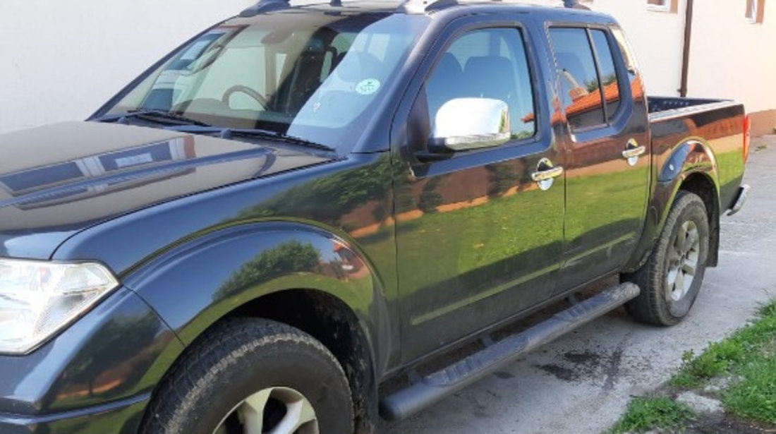 Aripa stanga fata Nissan Navara 2009 Pick-up 2.5 DCI