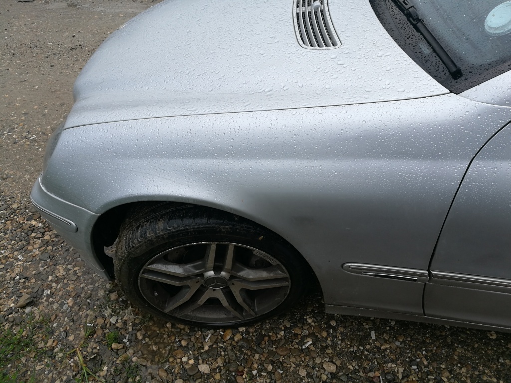 Aripa stanga Mercedes c class w203