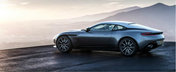 Dle. Bond, noua dvs. masina este aici. Permiteti-mi sa va prezint noul Aston Martin DB11!