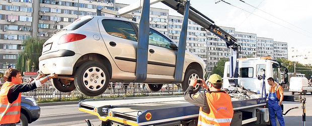 Atentie, soferi! Hingherii de masini se intorc, soferul va plati 500 de lei sa-si recupereze masina parcata neregulamentar