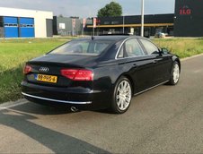 Audi A8 cu 855.315 kilometri la bord