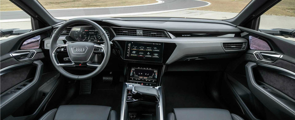 Audi ia fata Tesla si lanseaza pe piata prima masina de serie cu trei motoare electrice. GALERIE FOTO Audi ia fata Tesla si lanseaza pe piata prima masina de serie cu trei motoare electrice. GALERIE FOTO