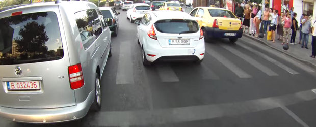 Biciclist prost vs sofer si mai prost in Bucuresti. Cine are dreptate?