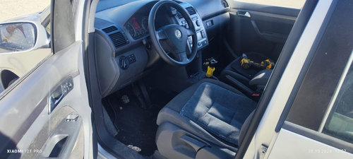Bloc lumini Vw Touran 1.9 TDI 105CP / 77 KW cod motor BLS transmisie manuala 6+1 cod JYK an 2008