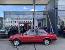 BMW 323i cu 260 de kilometri la bord