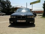 BMW 325 pisica neagra