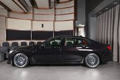 BMW 730i in Ruby Black Metallic