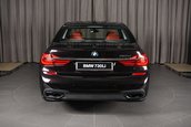 BMW 730i in Ruby Black Metallic