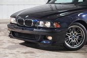 BMW M5 cu 5.399 de kilometri la bord