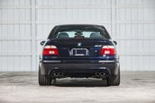 BMW M5 cu 5.399 de kilometri la bord