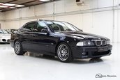 BMW M5 cu 56 mii km la bord