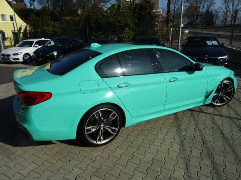 BMW M550i in Mint Green