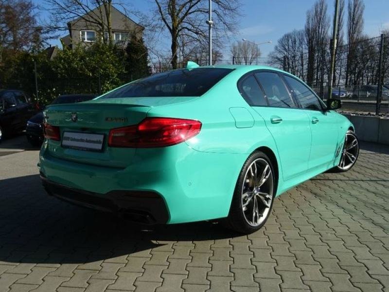 BMW M550i in Mint Green