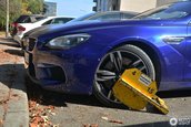 BMW M6 cu roata blocata