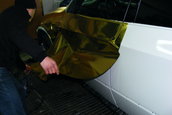 BMW X5 M imbracat in folie aurie