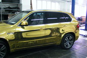 BMW X5 M imbracat in folie aurie