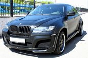 BMW X6 imbracat in piele de reptila