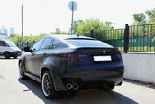 BMW X6 imbracat in piele de reptila