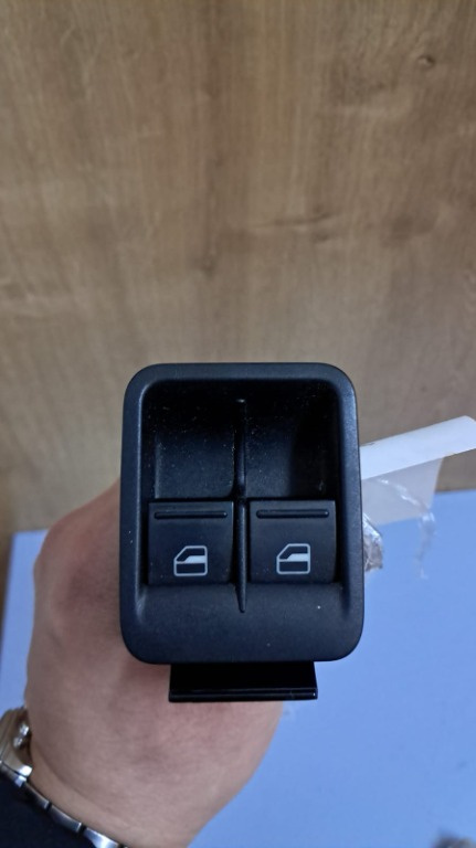 Butoane geam stanga fata VW Caddy 2004-2011 cod 1T0959527