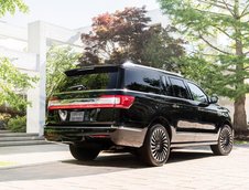 Cadillac Escalade si Lincoln Navigator