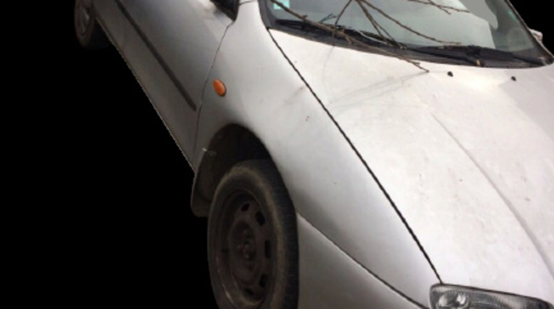 Cal schimbator cu suport pahare Mazda 323 BA [1994 - 1998] Hatchback 5-usi 1.5 MT (88 hp) F V (BA) 1.5L Z5 I4