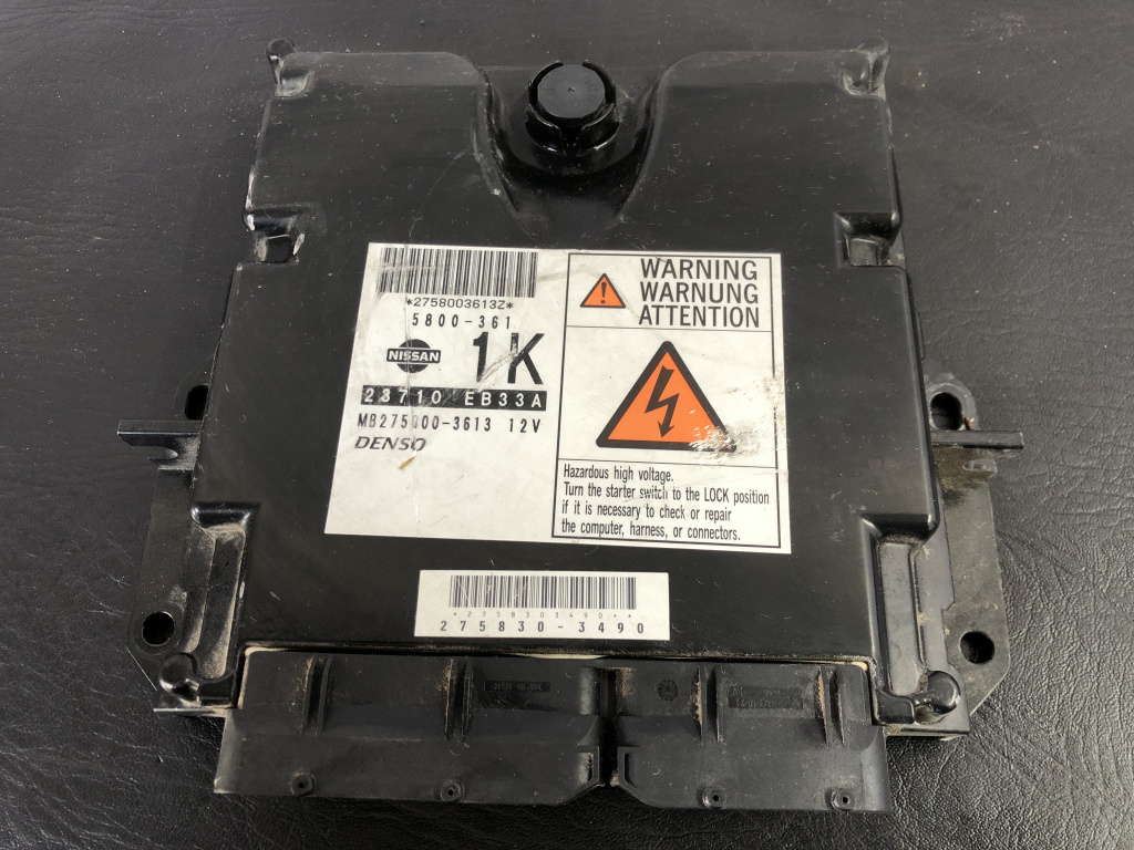 Calculator motor ecu Navara D40 argintiu automat sedan 2006 (28710EB33A)