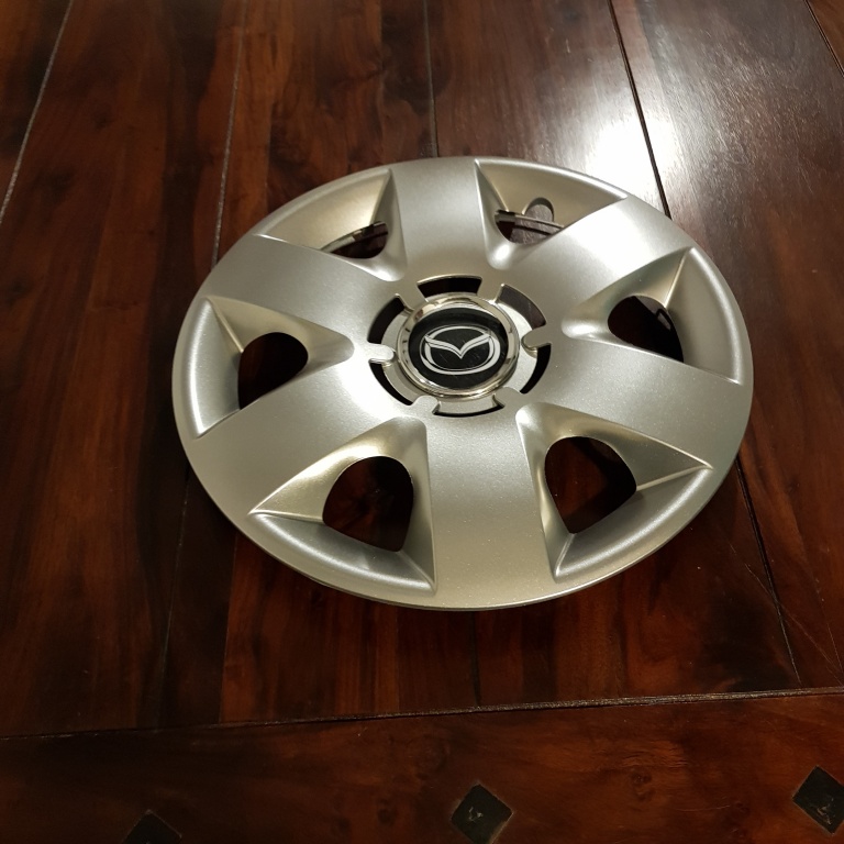 Capace Mazda r15 la set de 4 bucati cod 310