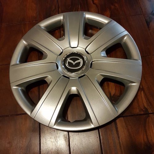 Capace Mazda r15 la set de 4 bucati cod 325