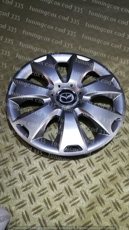 Capace Mazda r15 la set de 4 bucati cod 335