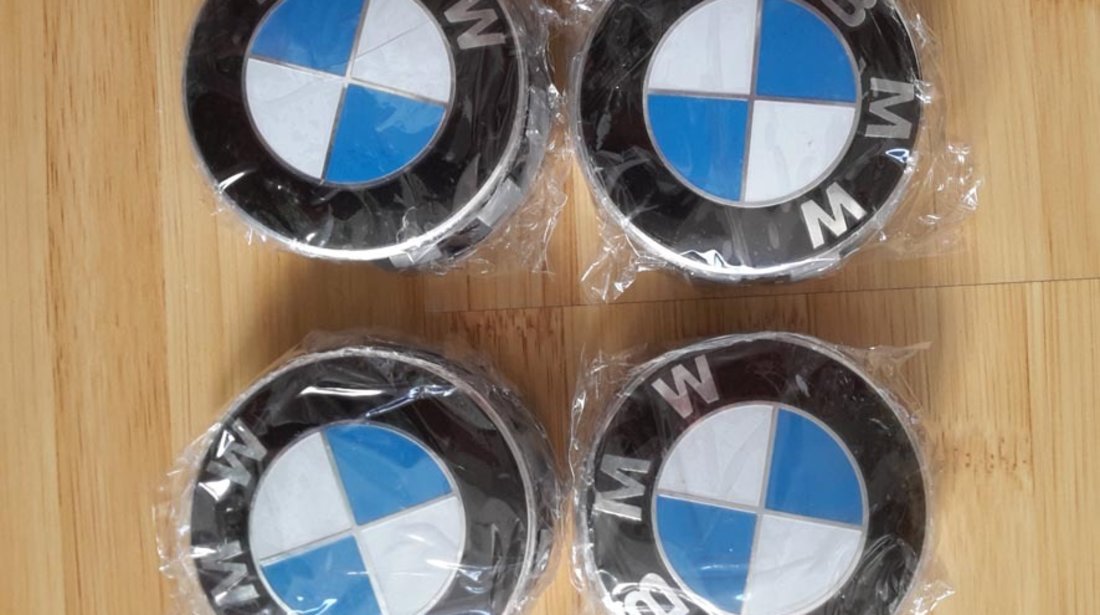 Capacele centrale NOI ORIGINALE pentru jante aliaj BMW 68 mm cu 10 picioruse