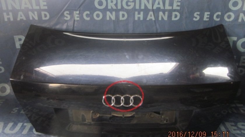 Capota spate Audi A4 (putin infundat deasupra la emblema)