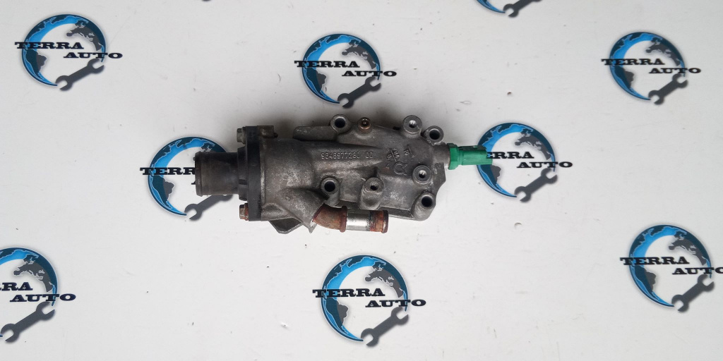 Carcasa termostat Peugeot 307 1.6 16V 80 KW 109 CP cod motor NFU