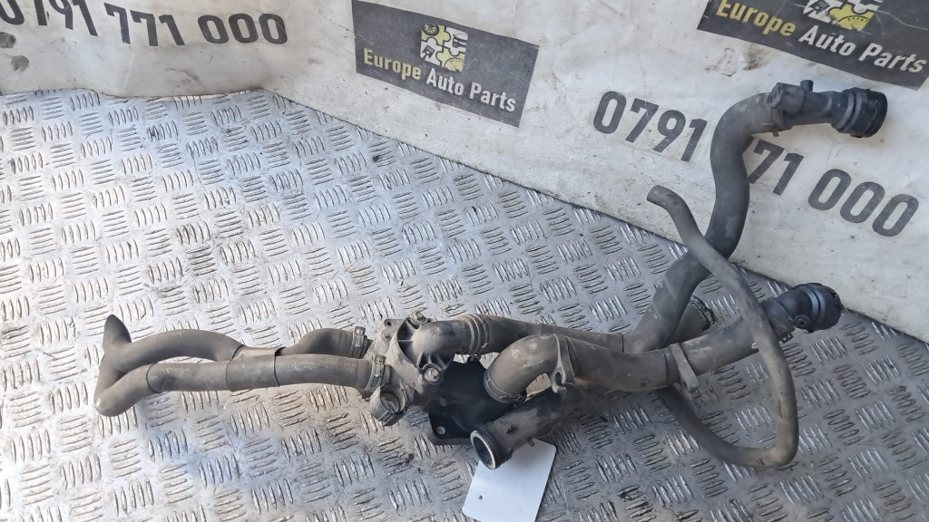 Carcasa termostat Seat Ibiza 1.4 16V cod motor BXM an 2008 cod 032121111CG
