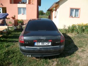 ce trebuie cumparat ca sa schimb fata la audi a6 2003 ,,sa-i pun grila mare ..