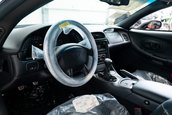 Chevrolet Corvette cu 27 de kilometri la bord
